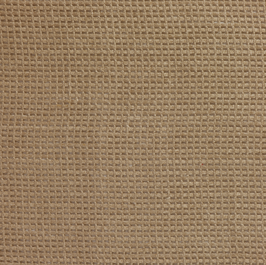 Close-up of a textured brown fabric surface