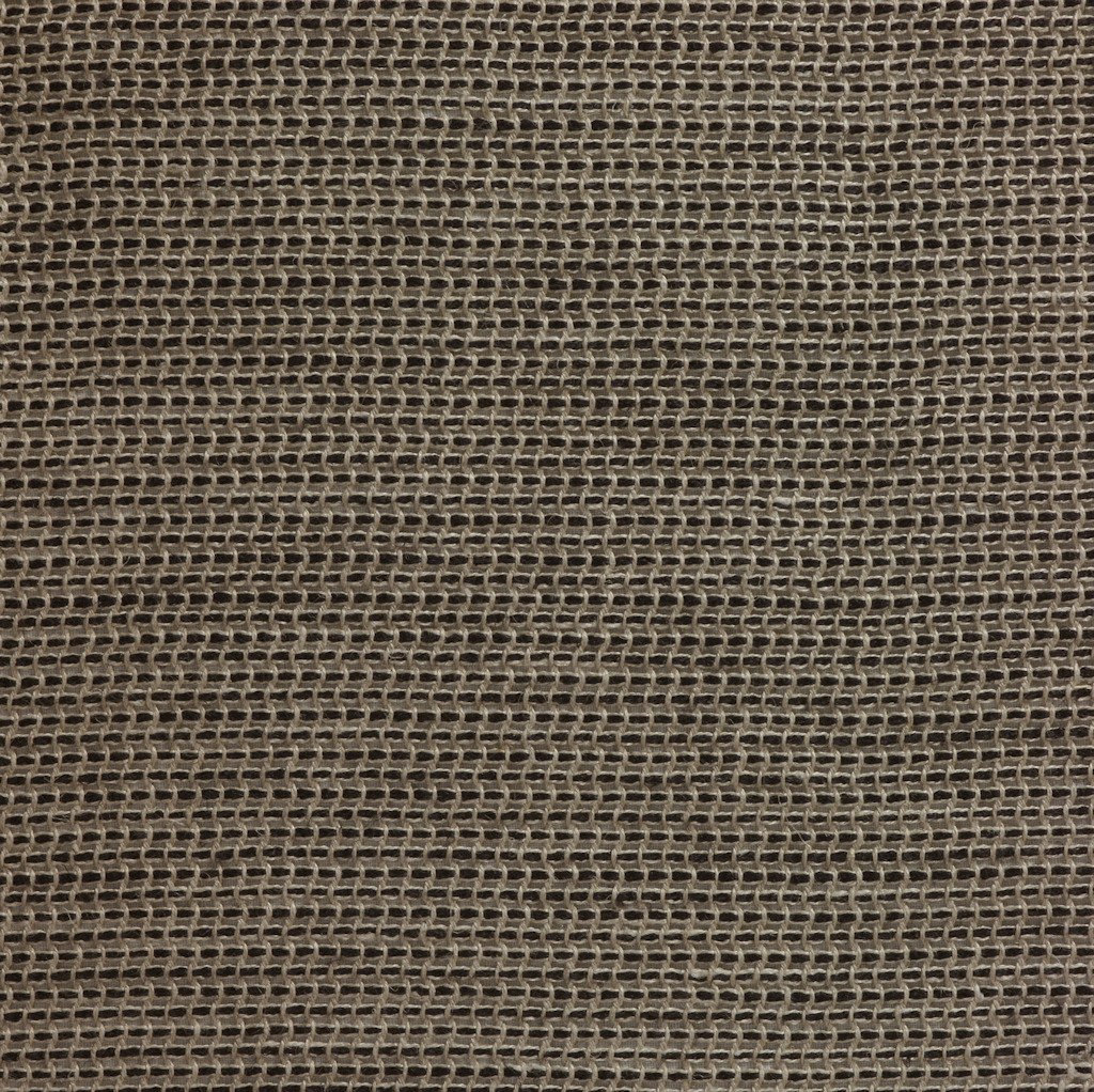 Close-up of a textured brown fabric surface