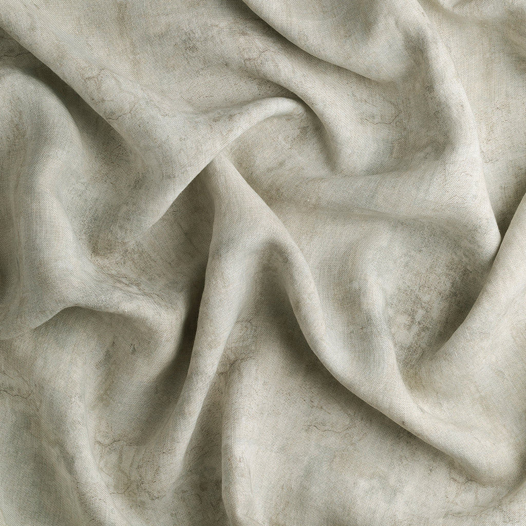Close-up of beige fabric with folds