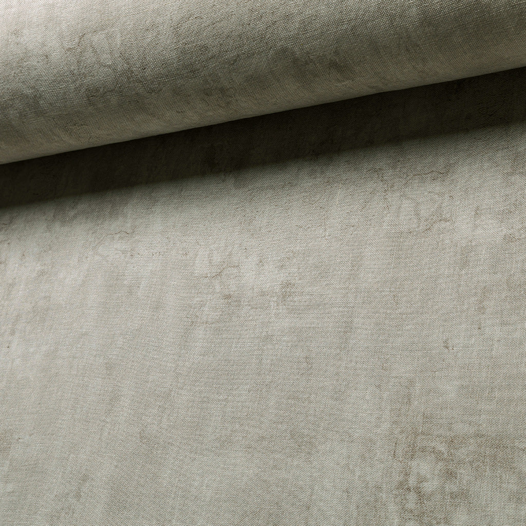 Close-up of textured gray fabric with a slight sheen