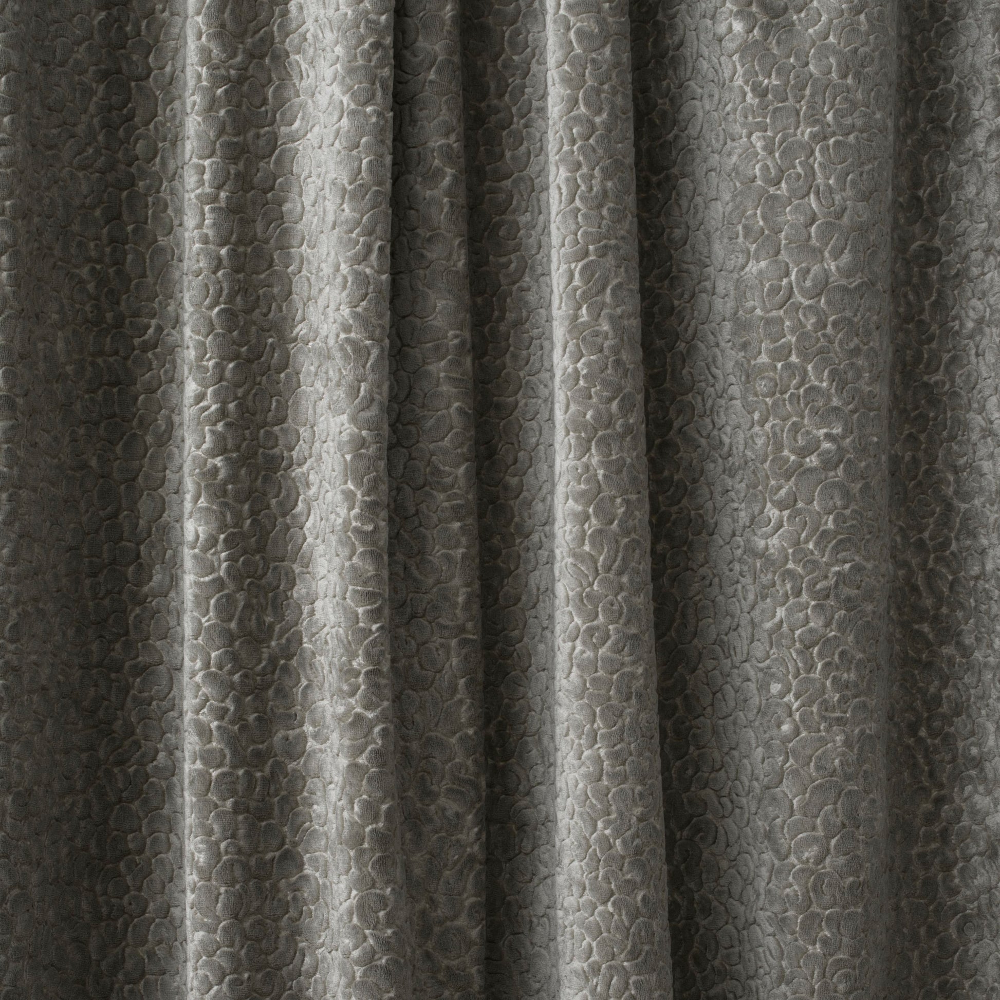 Close-up of textured gray fabric with a pattern